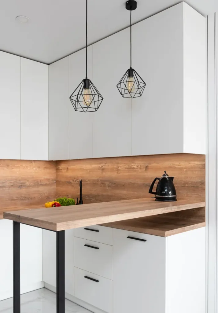 Modern kitchen with appliances and pendant lighting