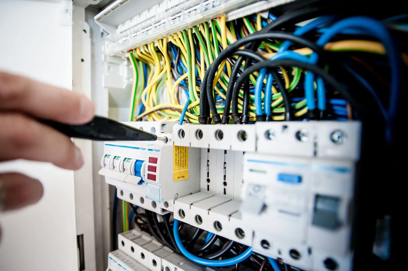 Stock photograph of electrical work inside an opened circuit breaker panel